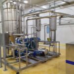 Cụm cô đặc inox nhập từ châu Âu trong nhà máy nước quả